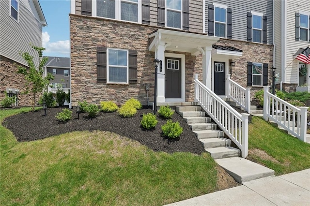 489 Nolan Cir, Cranberry Twp, PA 16066 - view of front of property featuring stone siding and a front yard