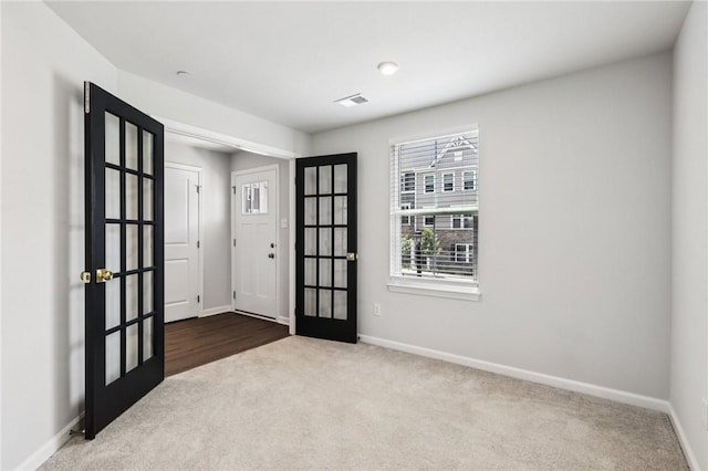 489 Nolan Cir, Cranberry Twp, PA 16066 - foyer entrance featuring french doors and carpet flooring