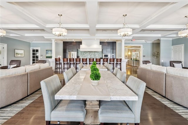 489 Nolan Cir, Cranberry Twp, PA 16066 - dining area with a chandelier, coffered ceiling, beam ceiling, wood finished floors, and crown molding