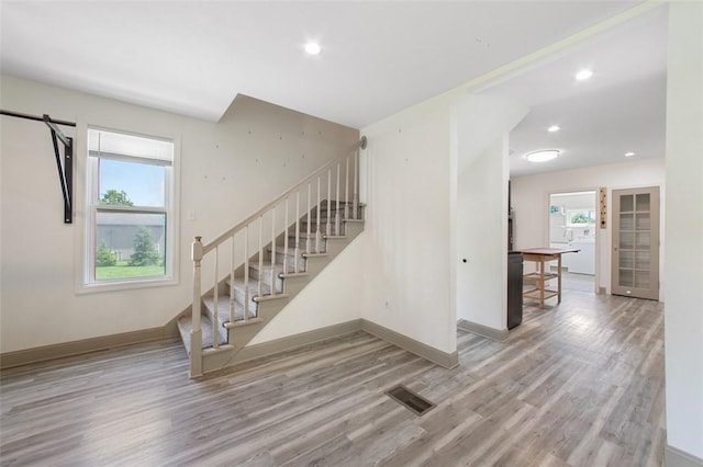 1431 Monastery Dr, Latrobe, PA 15650 - staircase with wood finished floors and recessed lighting