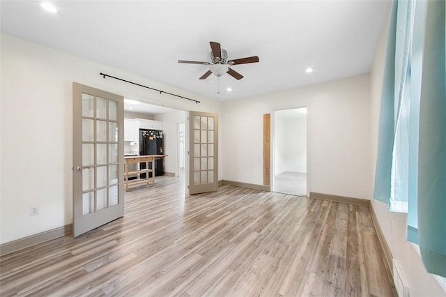 1431 Monastery Dr, Latrobe, PA 15650 - unfurnished room featuring french doors, light wood-type flooring, ceiling fan, and recessed lighting