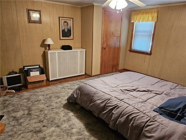 418 S Main St, Slippery Rock Boro, PA 16057 - bedroom featuring wood finished floors, ornamental molding, and wooden walls