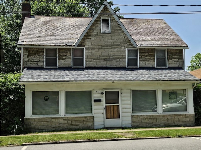 418 S Main St, Slippery Rock Boro, PA 16057 - view of front of house with stone siding and a chimney