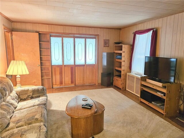418 S Main St, Slippery Rock Boro, PA 16057 - carpeted living area featuring wooden walls