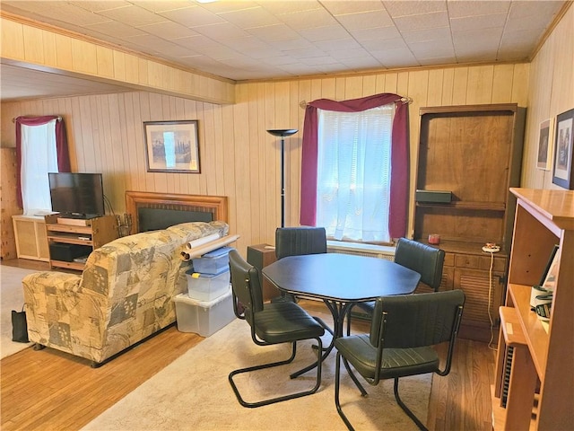 418 S Main St, Slippery Rock Boro, PA 16057 - dining area featuring wood finished floors, crown molding, plenty of natural light, and wooden walls