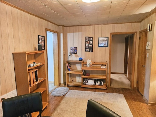 418 S Main St, Slippery Rock Boro, PA 16057 - sitting room with hardwood / wood-style flooring, wood walls, and crown molding