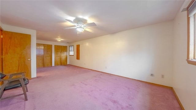 11297 Highpoint Dr, Penn Hills, PA 15235 - empty room with light colored carpet and a ceiling fan