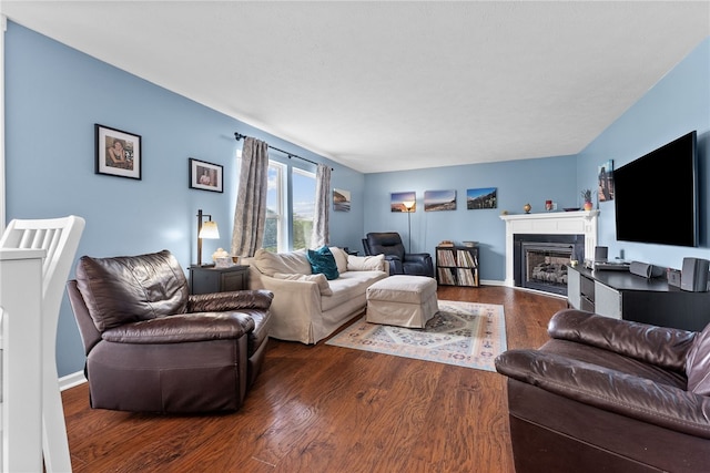 1020 Granite Dr, South Fayette, PA 15057 - living area featuring dark wood-style floors and a fireplace