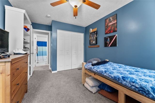 1020 Granite Dr, South Fayette, PA 15057 - bedroom featuring carpet, a closet, a ceiling fan, and a textured ceiling