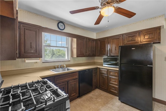 1031 Stratmore St, Ingram, PA 15205 - kitchen with black appliances, wallpapered walls, light countertops, dark brown cabinets, and ceiling fan