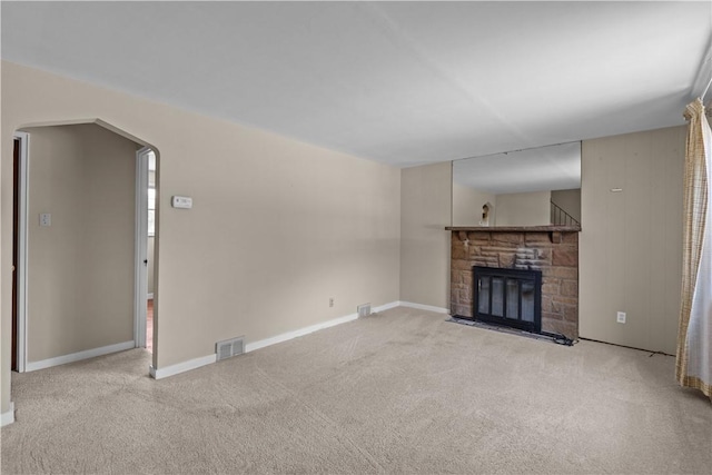 1031 Stratmore St, Ingram, PA 15205 - unfurnished living room featuring carpet floors and a stone fireplace