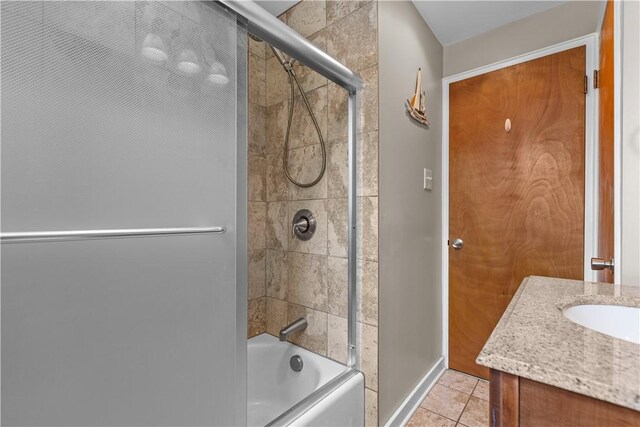 1031 Stratmore St, Ingram, PA 15205 - bathroom featuring combined bath / shower with glass door, vanity, and tile patterned floors