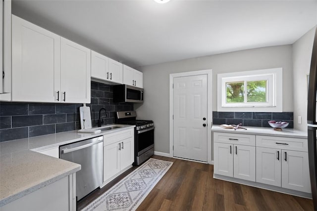 1822 Plainview Ave, Brookline, PA 15226 - kitchen with stainless steel appliances, tasteful backsplash, and white cabinets