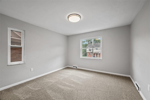1822 Plainview Ave, Brookline, PA 15226 - carpeted empty room with a baseboard heating unit and baseboards