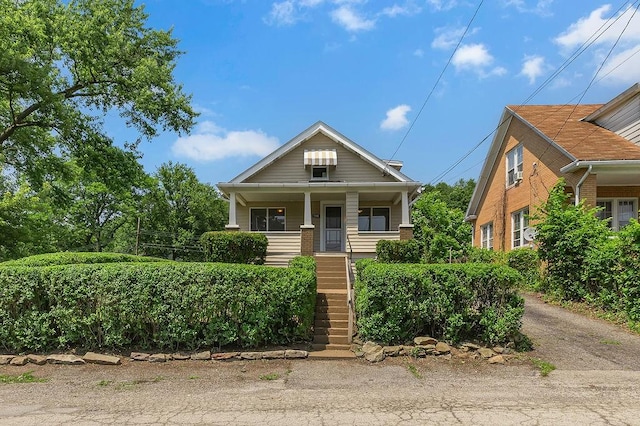 1586 Jackson St, Aliquippa, PA 15001 - bungalow-style home featuring stairway and a porch