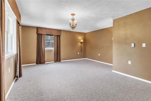 626 Solomon Temple Rd, Unity Twp, PA 15650 - carpeted empty room featuring a chandelier and baseboards