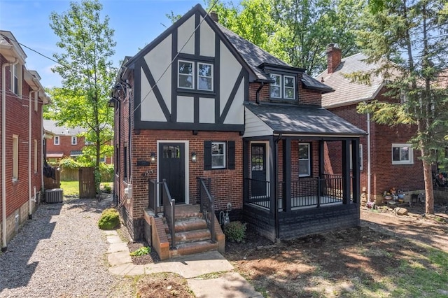 1313 Ingham St, Marshall Shadeland, PA 15212 - view of front of home with roof with shingles, brick siding, a porch, and stucco siding