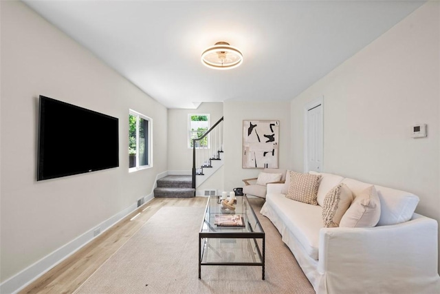 1313 Ingham St, Marshall Shadeland, PA 15212 - living room with light wood-style floors and stairway