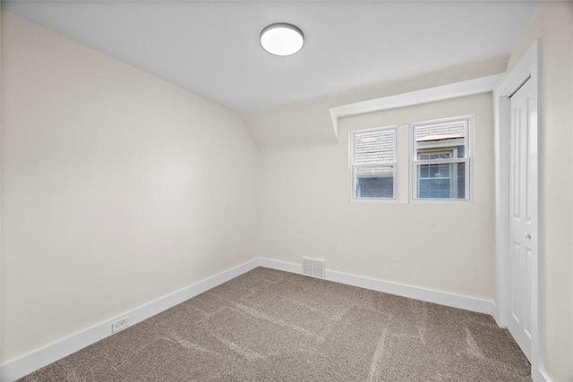 1313 Ingham St, Marshall Shadeland, PA 15212 - unfurnished room with carpet and lofted ceiling
