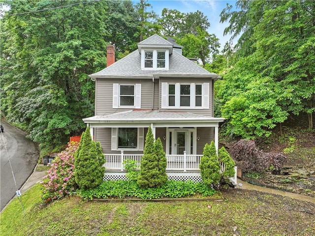 7504 Brighton Rd, Ben Avon, PA 15202 - traditional style home with a chimney, covered porch, and a shingled roof