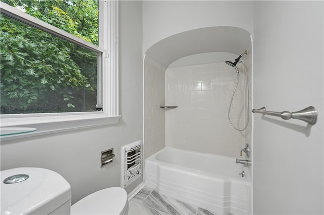 7504 Brighton Rd, Ben Avon, PA 15202 - full bathroom with heating unit, tub / shower combination, marble finish floors, and plenty of natural light