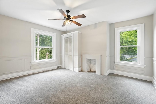 7504 Brighton Rd, Ben Avon, PA 15202 - unfurnished living room featuring carpet floors, a ceiling fan, wainscoting, and a decorative wall