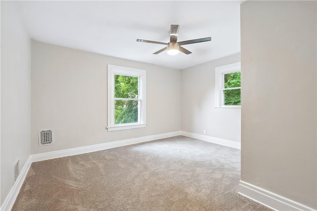 7504 Brighton Rd, Ben Avon, PA 15202 - carpeted empty room featuring plenty of natural light and ceiling fan