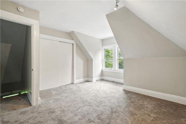 7504 Brighton Rd, Ben Avon, PA 15202 - additional living space with carpet floors and vaulted ceiling