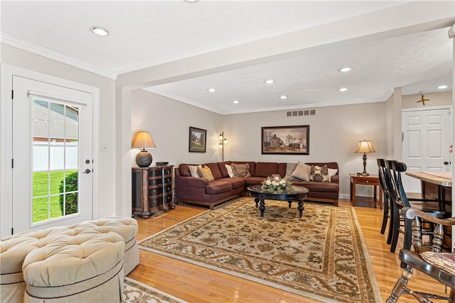 5 Robin Dr, South Strabane, PA 15301 - living area with healthy amount of natural light, light wood-style floors, ornamental molding, and recessed lighting