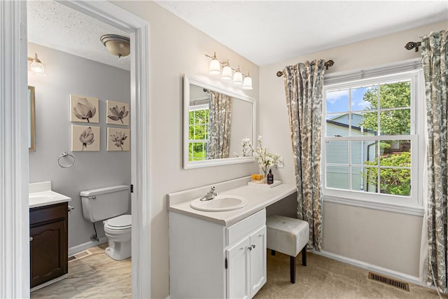 5 Robin Dr, South Strabane, PA 15301 - full bathroom featuring two vanities and toilet