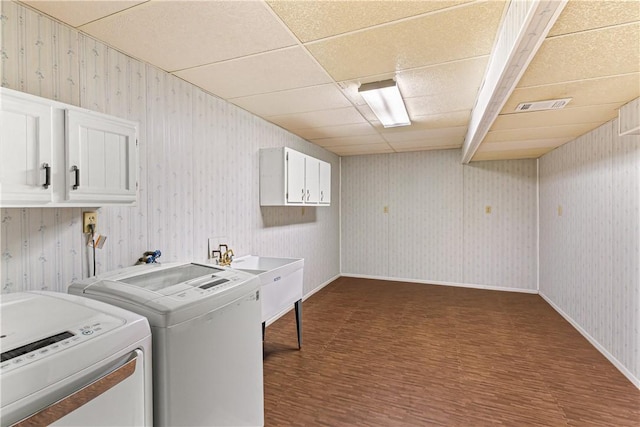 5 Robin Dr, South Strabane, PA 15301 - laundry area with cabinet space, washer and dryer, wallpapered walls, and dark carpet