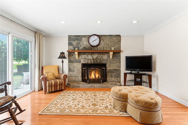 5 Robin Dr, South Strabane, PA 15301 - living area featuring crown molding, wood finished floors, a fireplace, and recessed lighting