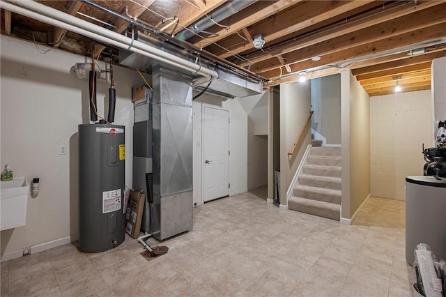101 Creekside Dr, Buffalo Twp, PA 16055 - below grade area with electric water heater, stairs, and heating unit