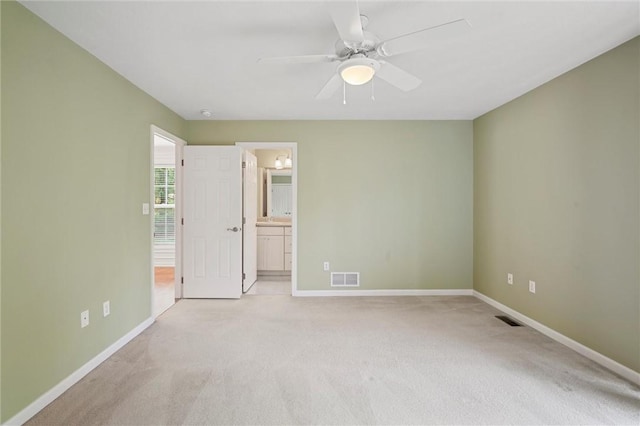 101 Creekside Dr, Buffalo Twp, PA 16055 - unfurnished bedroom with light carpet, ensuite bath, and ceiling fan