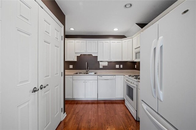 101 Creekside Dr, Buffalo Twp, PA 16055 - kitchen featuring white appliances, white cabinetry, dark wood-type flooring, recessed lighting, and light countertops