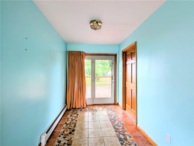 323 E 2nd St, Derry Boro, PA 15627 - doorway with baseboard heating and light tile patterned flooring