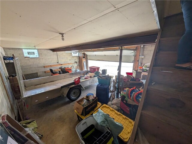 323 E 2nd St, Derry Boro, PA 15627 - garage with concrete block wall and a workshop area
