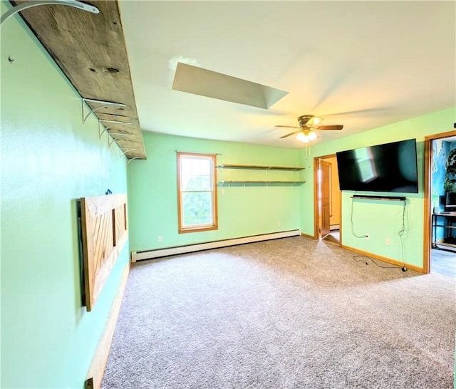 323 E 2nd St, Derry Boro, PA 15627 - unfurnished living room featuring baseboard heating, ceiling fan, and carpet