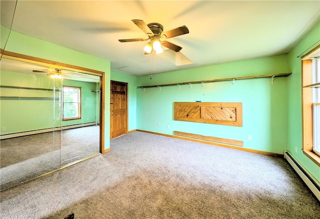323 E 2nd St, Derry Boro, PA 15627 - unfurnished living room with baseboard heating, carpet, and ceiling fan