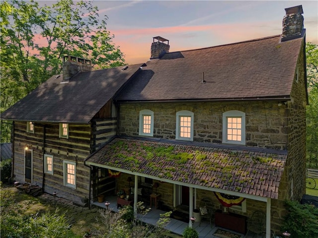 117 Havers Hill Rd, Jefferson/Mather, PA 15344 - back of property with a chimney, stone siding, and a deck