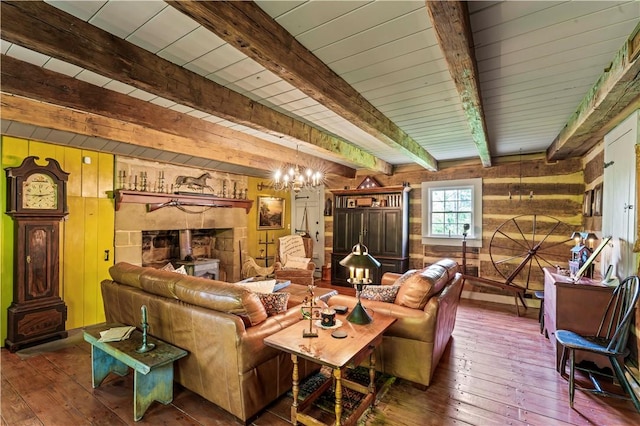 117 Havers Hill Rd, Jefferson/Mather, PA 15344 - living room with wood walls, hardwood / wood-style floors, beam ceiling, and a chandelier