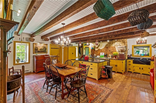 117 Havers Hill Rd, Jefferson/Mather, PA 15344 - dining space featuring a chandelier, light wood-type flooring, and beamed ceiling