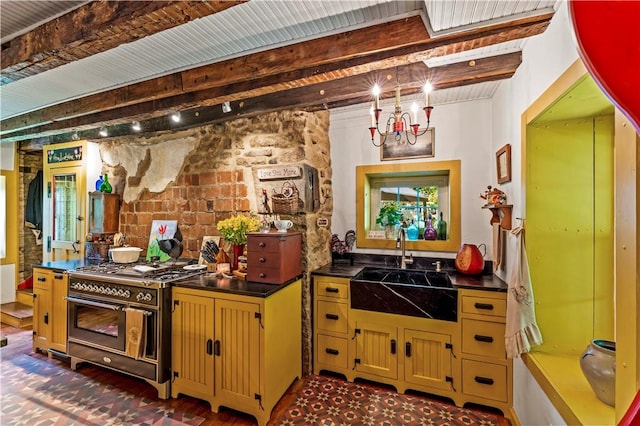 117 Havers Hill Rd, Jefferson/Mather, PA 15344 - kitchen featuring range with two ovens, beam ceiling, dark countertops, and a chandelier