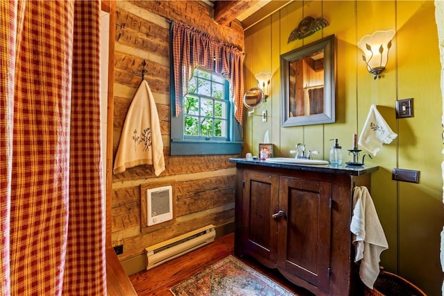 117 Havers Hill Rd, Jefferson/Mather, PA 15344 - bathroom featuring a baseboard heating unit, vanity, wood finished floors, wooden walls, and heating unit