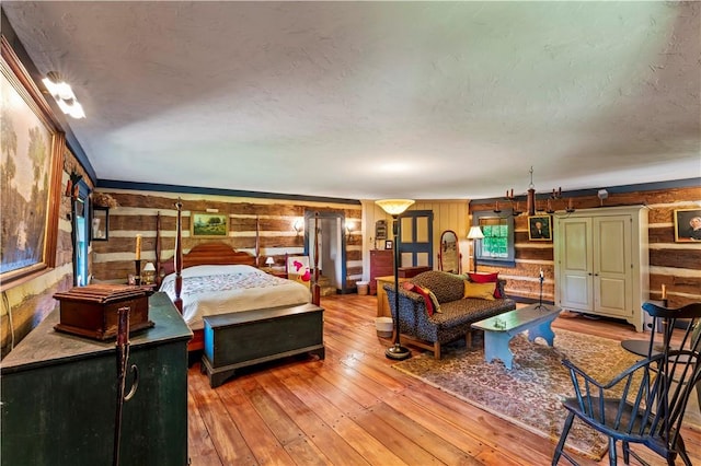 117 Havers Hill Rd, Jefferson/Mather, PA 15344 - bedroom featuring wooden walls and light wood-style flooring