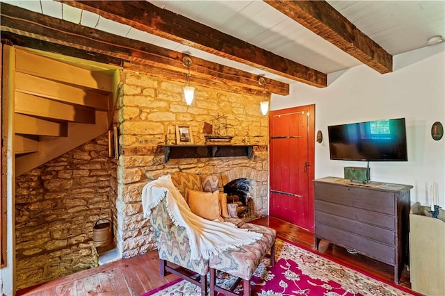 117 Havers Hill Rd, Jefferson/Mather, PA 15344 - living area featuring hardwood / wood-style flooring, a stone fireplace, and beam ceiling