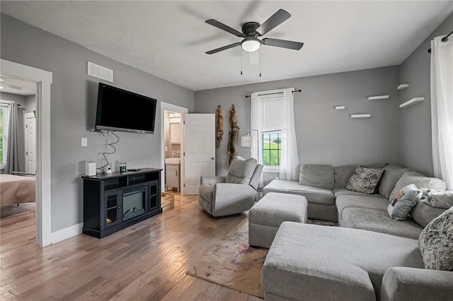 943 State Route 66, Gilpin Twp, PA 15690 - living area with light wood-type flooring and ceiling fan