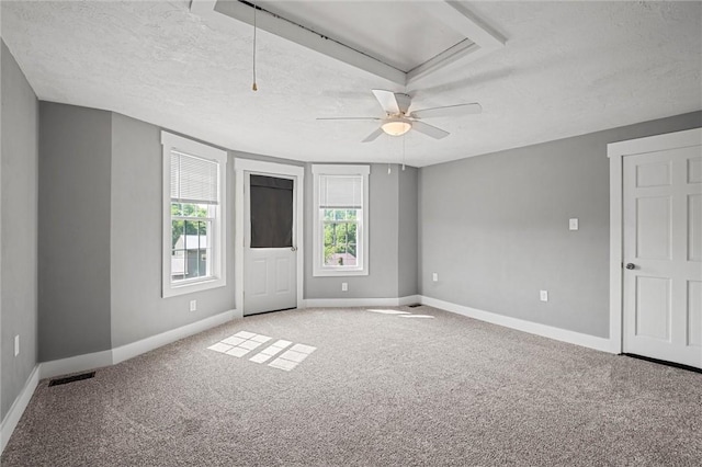 943 State Route 66, Gilpin Twp, PA 15690 - empty room with a textured ceiling, carpet, a ceiling fan, and attic access