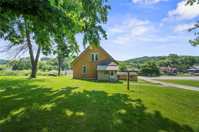943 State Route 66, Gilpin Twp, PA 15690 - view of home's exterior with a lawn
