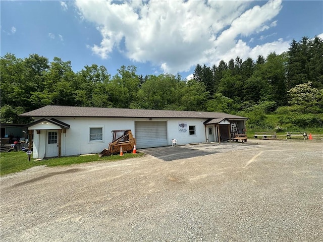 1389 Indian Creek Valley Rd, Saltlick Twp, PA 15462 - view of front of house featuring an attached garage and driveway